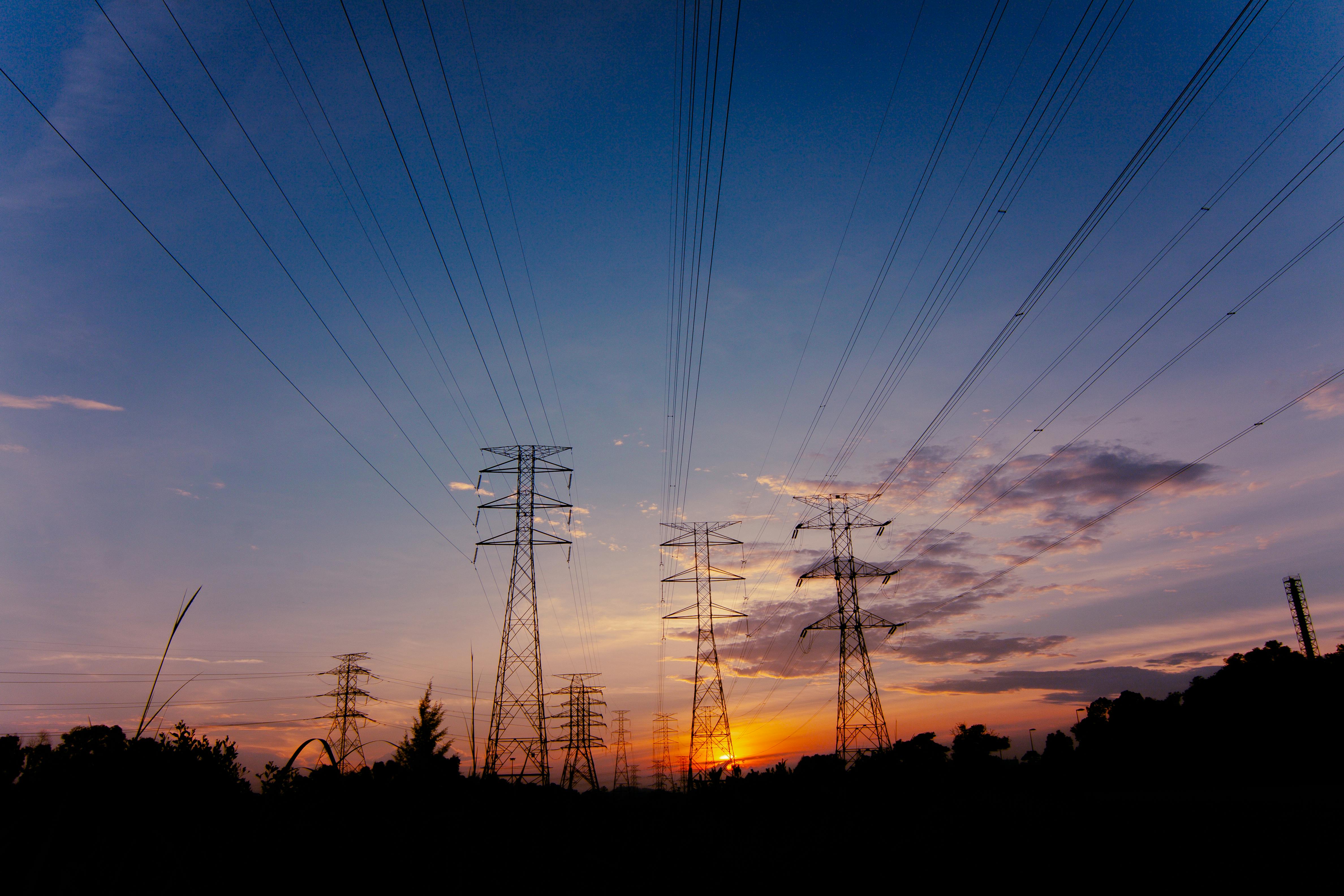 Transmission Towers at Sunset · Free Stock Photo